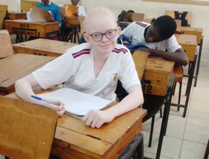 Our student Blessing with her new glasses