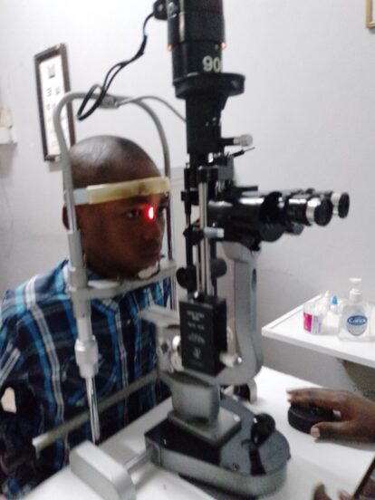 Our student Brighton gets his eyes tested