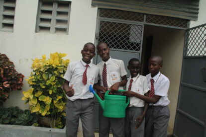 The boys watering trees after our tree planting project.