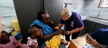 Our chair trustee giving a polio vaccination