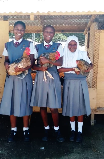 Happy girls, happy chickens