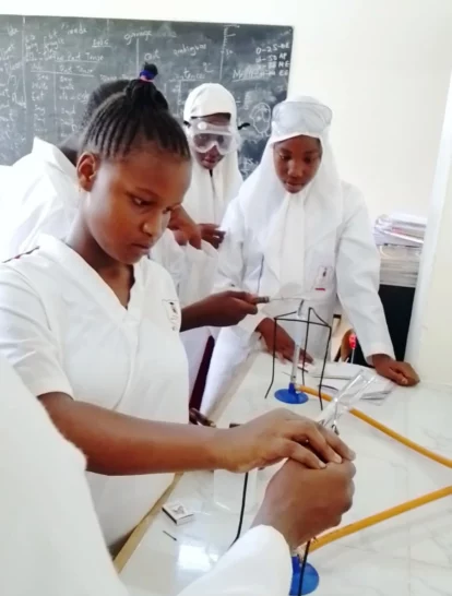 Girls taking part in science